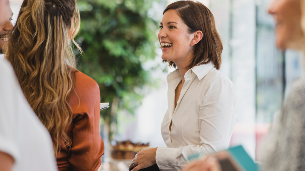 How Stage 3 Tax Cuts Can Boost Your Borrowing Capacity Featured Image Of Two Women Talking and One Of The is Smiling