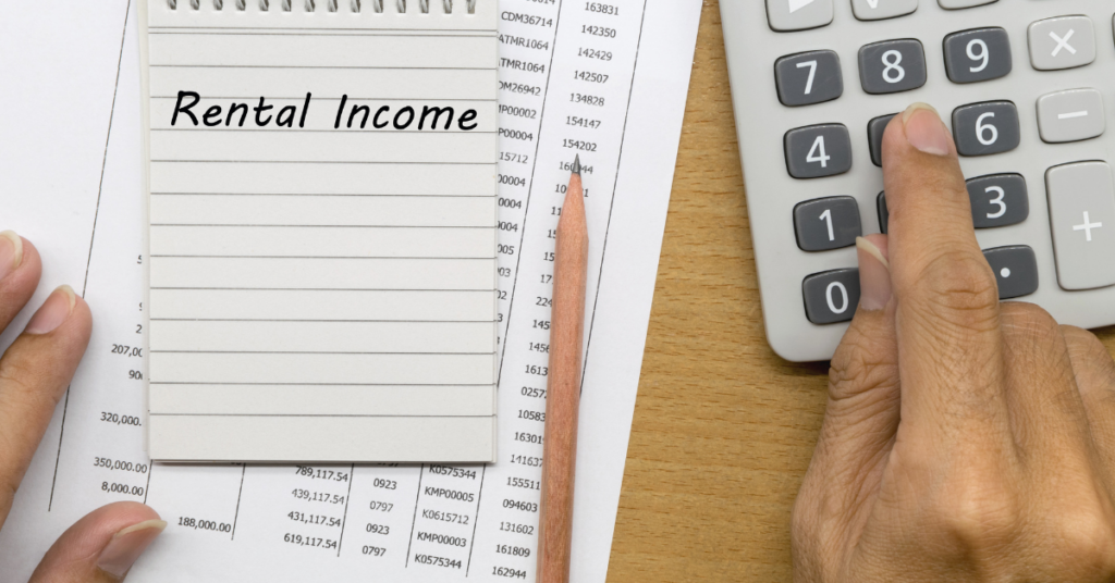 A Person is calculating Rental Income using calculator to come up with her next super smart property investment strategy or smart investment strategy
